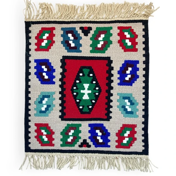 Handwoven wool rug with ethnic ornaments or Pirot motifs-1
