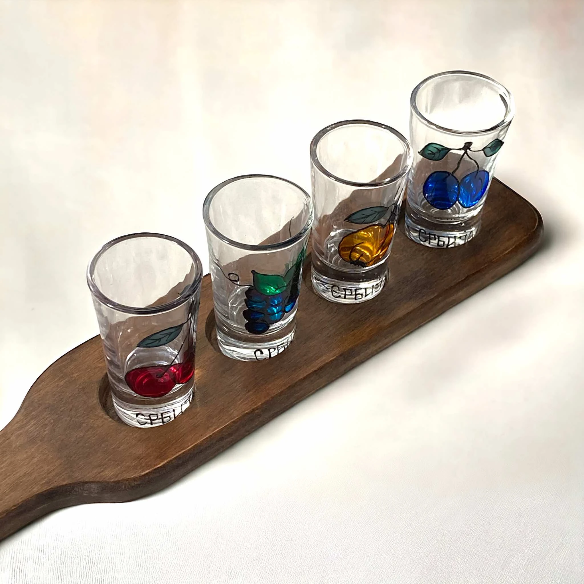 Set of painted glasses on a board-2