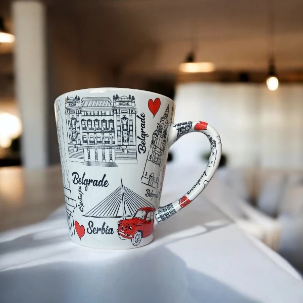 Belgrade ceramic mug with illustrations of Ada Bridge, the Victor monument, National Assembly, and other Belgrade landmarks.-2